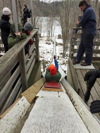 Sliding out into the chute... (Photo by Holly S. Edwards)