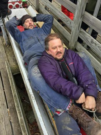 Tucked in, with his microphone running, MBPN reporter Jay Field and Toboggan Committee member and veteran racer Jim Jefferson are ready for their run. (Photo by Holly S. Edwards)