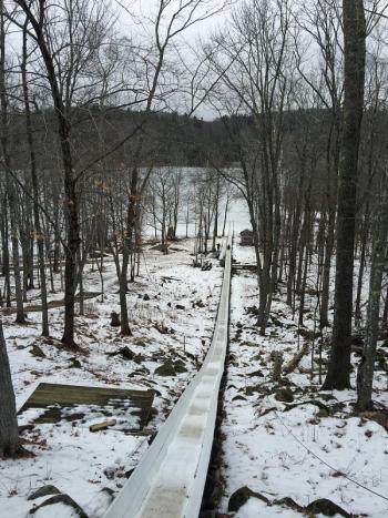 It’s a long way down the 440-foot-long, one-of-a-kind wooden toboggan chute, but all of Friday’s reporters and bloggers made it down and back up safely to report another day. (Photo by Holly S. Edwards)