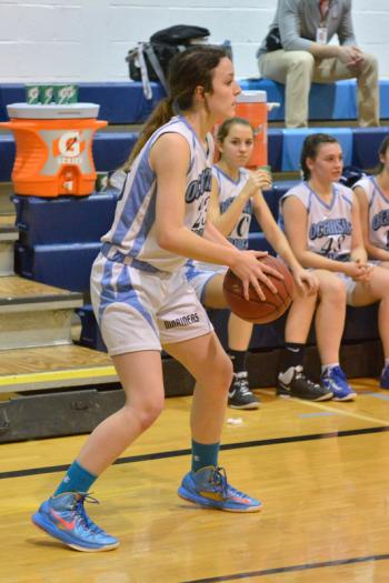 Oceanside’s Amelia Campbell looks to pass the ball out of the corner as the Mariners were trying to run time off the clock. (Photo by Ron Hawkes)