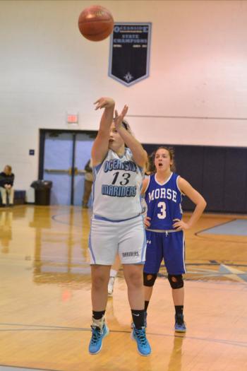 Oceanside’s Raechel Joyce fires off a jump shot. (Photo by Ron Hawkes)
