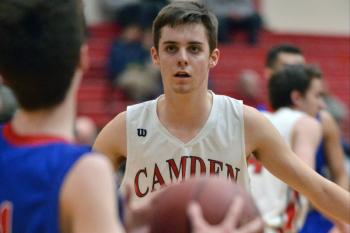 Camden Hills Dalton Oakes is focused on the ball on the inbounds play. (Photo by Ron Hawkes)