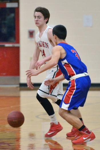 Camden’s Devin Vangel, left, works to get past Mt. Ararat’s Cam Cox. (Photo by Ron Hawkes)