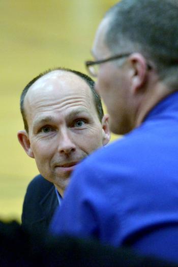 Mt. Ararat coach Steve Cox talks with his assistant during Friday’s game n Rockport. (Photo by Ron Hawkes)