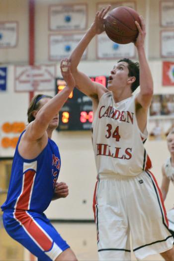Camden’s Morgan Ford gets up over Mt. Ararat’s Alex Lafountain. (Photo by Ron Hawkes)