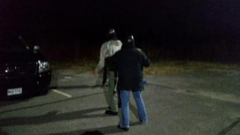 A student in the Knox County Sheriff’s Office Citizens’ Police Academy ‘apprehends’ a person who may have a weapon during a role-playing exercise. (Photo by Sarah Shepherd)