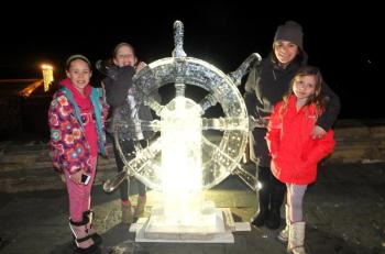 From Cape Elizabeth Dora Hurt, Stella Crawford, Maddie McCarley and Sandy Shapiro-Hurt enjoy the ice carvings.