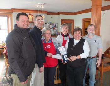 Maritime Energy presents its matching funds of $2,000.