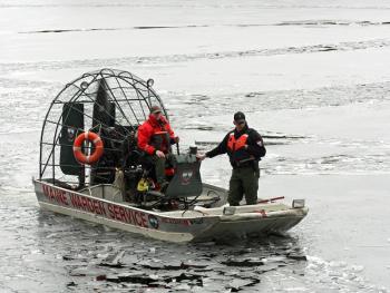 Trueman Moore is brought back to shore to be reunited with his family. (Photo by Holly S. Edwards)