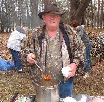 No outing at the museum is complete without Chuck Wagon beans. Maynard Stanley Jr. said he had been cooking for two days getting ready for Maple Sunday. “I did maple walnut cupcakes, maple walnut crème chocolates and maple melt away cookies,” he said. “And then I did maple chuck wagon beans. I usually don’t use maple in them, but seeing how it was Maine Maple Sunday, I made an exception.” (Photo by Chris Wolf)