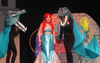 Kate Upham, Annabel Milisa-Parker and Robyn Walker-Spencer try to turn the little mermaid to the dark side. (Photos by Chris Wolf)