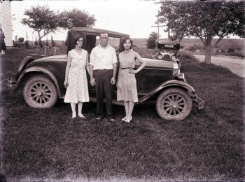 Two Women, One Man and a Model A