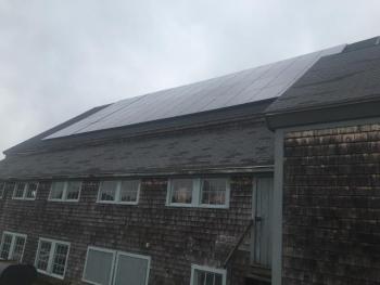 Solar panels on the barn roof at Morris Farm on Gardiner Road in Wiscasset meet a mostly gray morning sky April 2. SUSAN JOHNS/Wiscasset Newspaper