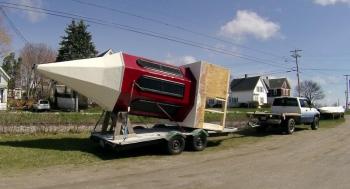 From the ground to the top of the building, a new steeple gets set into place.
