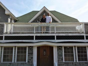 Chef Kelly Farrin and his partner, and future wife, Sasha Morin, stand on the deck of their new business, Carriage House Restaurant, in East Boothbay. SUZI THAYER/Boothbay Register