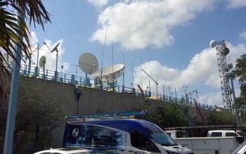 A weather balloon is released each morning, and outside the building, lots of antennas!