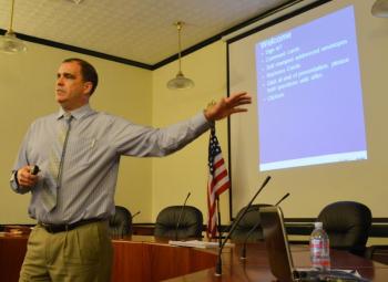 Ernie Martin, Maine Department of Transportation Project Manager, talks to a roomful of Camden, Lincolnville and Rockport residents, officals and state representatives about the upcoming reconstruction of Route One North in Camden. (Photo by Lynda Clancy)