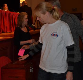 Marci Annis casts a silent ballot. (Photo by Lynda Clancy)