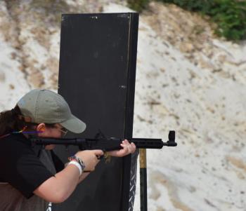Abigail Hammond shoots the “Peek-a-Boo” course at the American Marksman Northeast Regional Championship competition July 16-17. (Photo by Doug Hammond)