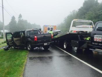 This pickup truck hit the back of a sedan that had slowed or stopped to turn, pushing the sedan into oncoming traffic where it crashed head-on with another car. (Photo by Lynda Clancy)