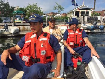 On the way to Curtis Island on July 18, Coast Guard petty officer MK3 Joseph Pineda, Camden Harbormaster Steve Pixley and BMC Sean Dolan. (Photo by Bob Trapani)