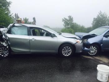 The silver car on the left was rear-ended by a pickup truck (not shown), and pushed into oncoming traffic on Route 17, by Green Thumb, where it collided head-on with the blue sedan on the right. (Photo by Lynda Clancy)