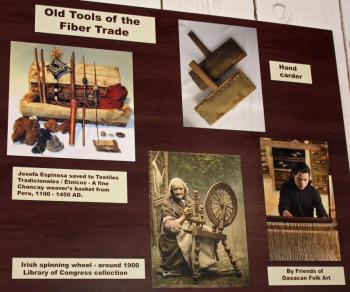 The Experience Room also includes education boards, explaining some of the history of textile tools and examples of ancient tapestries. (Photo by Holly S. Edwards)