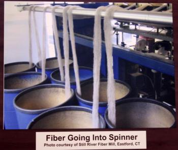 Another photo shows alpaca fiber going into a spinner at Still River Fiber Mlll in Eastford, Conn., a mill that works with small farms and in small batches. (Photo by Holly S. Edwards)