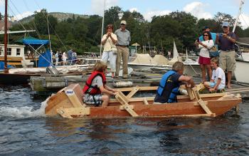 This paddle boat design moves a lot of water as it begins the race. (Photo by Holly S. Edwards)