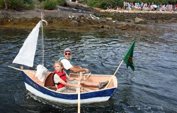 A solid and sturdy designed handmade boat makes it way back around the course. (Photo by Holly S. Edwards)
