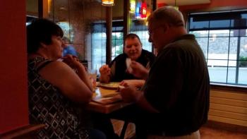 Waldoboro Police Chief Bill Lambarde sold raffle tickets while Waldoboro Police Officer Larry Hesseltine waited tables. (Photo by Sarah Shepherd)