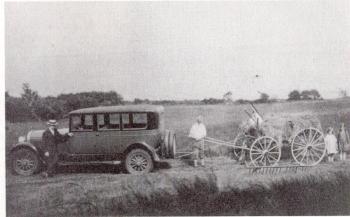 The Pattisons contributed their Cadillac to pull in the hay wagon down on the shore.
Photo courtesy of Lincolnville Historical Society haying