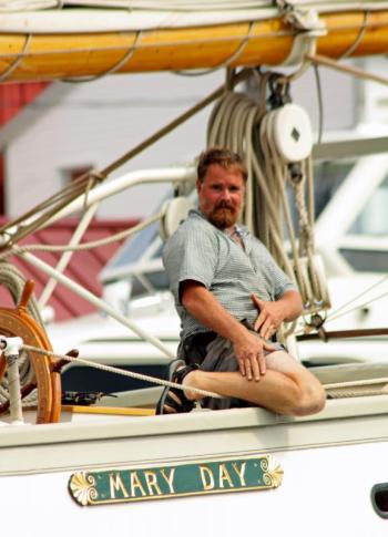 Capt. Barry King, of the schooner Mary Day, displays his sense of humor and his summer sailing tan on his way into Camden Harbor Friday afternoon. (Photo by Holly S. Edwards)