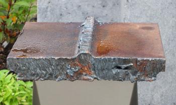 A piece of World Trade Center steel that was donated to the city of Rockland by the New York City Fire Department. SteelPro created the pedestal on which the historic piece of steel now rests.