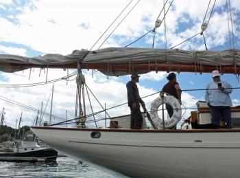 Rebuilt stem to stern, and returned to her original name, Ladona arrives in Camden Harbor Friday. (Photo by Holly S. Edwards)