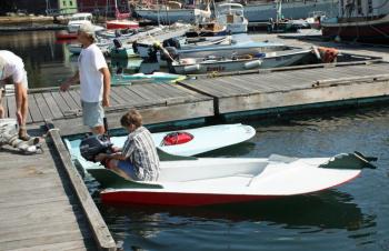 Next year, the hope is that Build-a-Boat competitors will be given kits to make these boats for a real race around the head of the harbor. (Photo by Holly S. Edwards)
