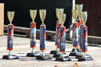 Build-a-Boat trophies included First, Second and Third place in the race, Best Design, First to Sink and People’s Choice. Another award was also given this year for Best Sink. (Photo by Holly S. Edwards)