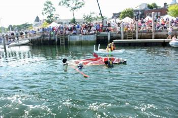 Team Coffin sinks a few yards off the starting line and was unable to finish the race, but did win the Best Sink trophy. (Photo by Holly S. Edwards)