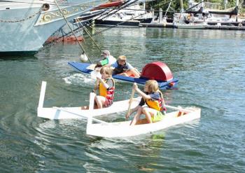 Free of their tangle with Just 4 Fun, the Wright boys aboard Sinking Turkeys move onward on the race course. (Photo by Holly S. Edwards)