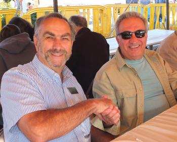 State Sen. Dave Miramant joins Ted Kanallakis for pancakes on the Camden Public Landing Saturday morning.