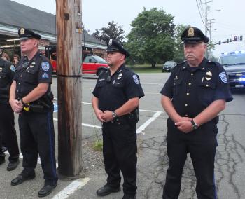 Rockland police officers Kenneth Smith, Scott Solorzano and Chief Bruce Boucher join in Sunday’s 9/11 remembrance.
