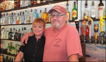 Corinna and Greg Howland, owners of the Happy Clam. (Photos by Chris Wolf)