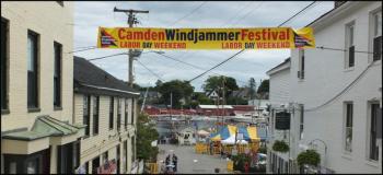 A banner announcing the entrance to the festival and the public landing. (Photos by Chris Wolf)