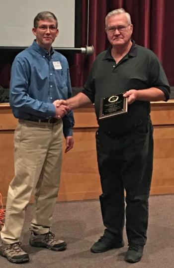 MSBA President Richard McLaughlin and EAS Master Beekeeper Rick Cooper, who was awarded an MSBA Lifetime Achievement Award Oct. 15 during the Association’s annual meeting in Rockland. (Photo by Matt Mank)