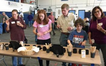 Tasting honey during the 2016 Black Jar (blind) Honey Tasting Contest. (Photo by Holly S. Edwards)