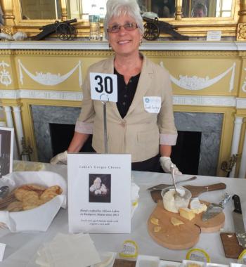 Lakin's Gorges Cheese served by museum volunteer Judy Corbin.