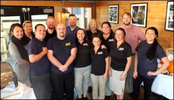 Staff fm Sea Dog welcomes patrons to the Community Bar-B-Q. Jennifer Sanderson, Joe McBrady, Ryan Stockburger, Amanda Dennison, Jessica Sinclair, Ali Simonds, Teresa Mastricolo, Sara Stine, Jessa Hardie, Christine MacWilliams, Matthew Booth, Connor Scott and Shelly Trich (Photos by Chris Wolf)