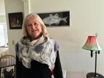 Helen Farnham wearing one of her newest artistic projects — scarves. SUZI THAYER/Boothbay Register