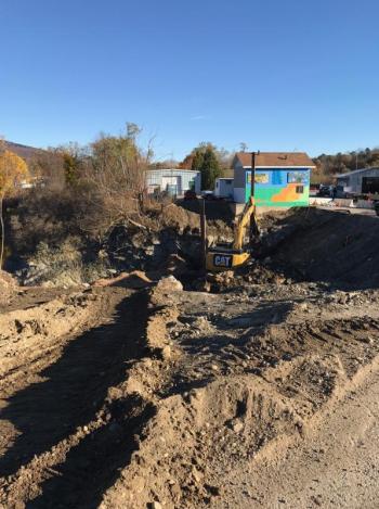 The hole between the north and south ends of Jacobs Quarry will eventually be 58-feet-deep and then refilled with concrete to act as a barrier and reduce water flowing from one to the other. (Photo by David Edwards)
