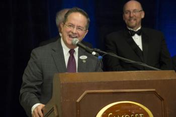 Connie Russell, at the podium, was named Community Person of the Year by the Penobscot Bay Chamber of Commerce. (Photo courtesy Michael O’Neil)